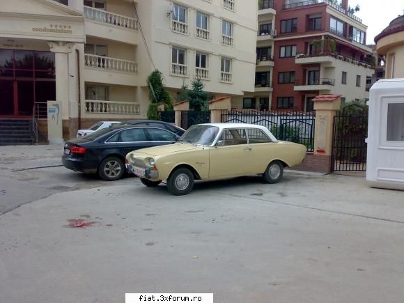 ford taunus 17m 1963 iar aici poza cartierul francez langa masina tot germana dar moderna